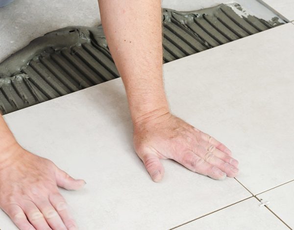 Elevate Spaces with Vision Three: Premier Tile Fixing Company in Dubai